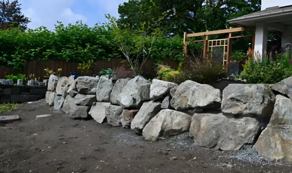At Retaining Walls Kapiti we apply skilled stone retaining walls craftsmanship